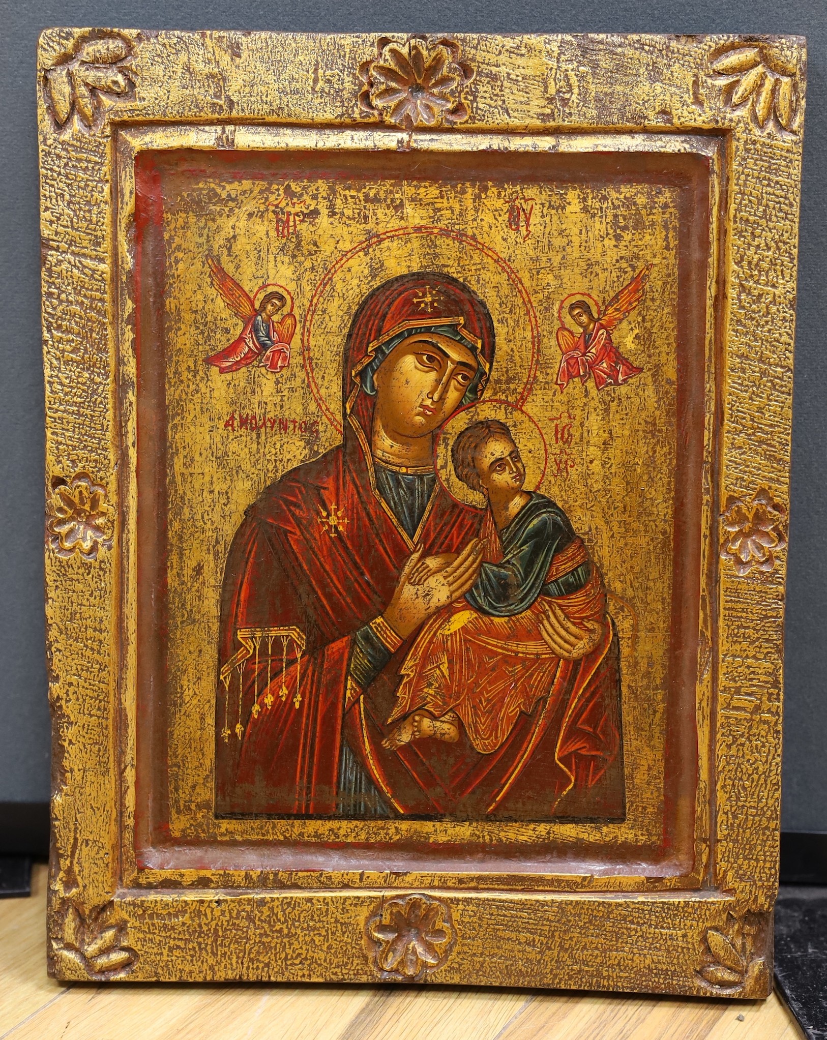 Eastern European School, tempera on panel, Icon of the Virgin and child, 36 x 28cm